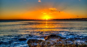 Beach destination at sunset illustrating vacation destination deals