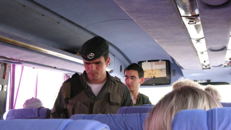 Soldiers board bus to check Fahed's passport_1770